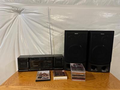 MAGNAXOX AM/FM CASSETT BOOM BOX WITH SONY SPEAKERS AND CDS