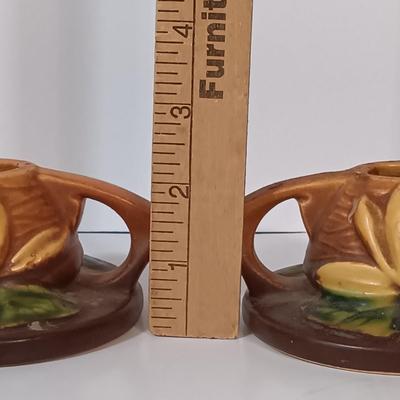 LOT 158: Roseville Pottery Water Lily Candle Stick Holders