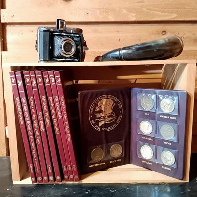 LOT 164: North American Hunting Club Collectors Coin Set and Books with Vintage Camera & Antique/Vintage Powder Horn
