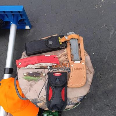 LOT 181: Reels on Wheels Fishing Cart Accessory with a Big Game Storage Bucket, Various Knives & More