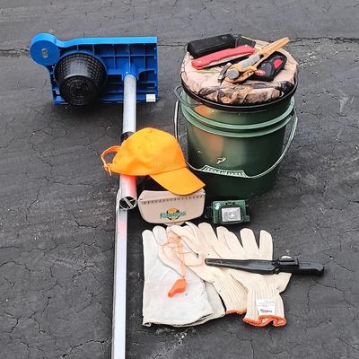 LOT 181: Reels on Wheels Fishing Cart Accessory with a Big Game Storage Bucket, Various Knives & More