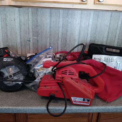 LOT 184: Porter Cable Circular Saw, Black & Decker Jig Saw, Milwaukee Belt Sander and More