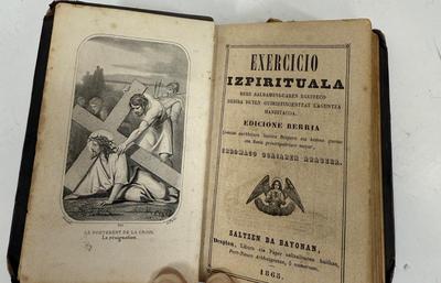 Sale Photo Thumbnail #23: Title translates to: Spiritual Exercises of Great Help to Christians Who Desire to Work Out Their Salvation: New Edition.  As best as we can tell, published by the Catholic Church in Bayonne, France (a large city is the Basque region of Southern France) i