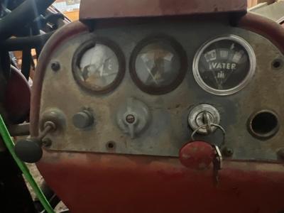 Sale Photo Thumbnail #28: Farmall 400, One of the tires is flat, there is a hydraulic issue with the bucket. Has not run in time, but did run a while ago.