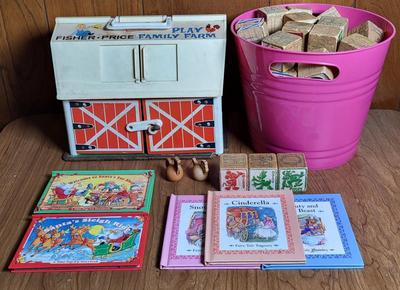 LOT 69L: Vintage Toy Lot Including Disney Books, Disney Blocks, Fisher Price and More
