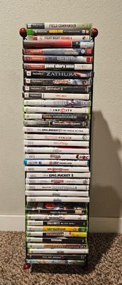 Sale Photo Thumbnail #1: Video Game Lot with Stand | Nintendo Wii U, Wii, Xbox, Playstation, Sony PSP