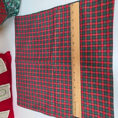 LOT 67P: Christmas Decor Including Quilted Wall Hanging, Hand-Made Coasters, Table Napkins, Cloth Basket, Round Trivets, and More