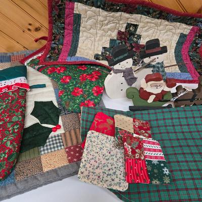 LOT 68P: Hand-Made Christmas Decor Including Two Stockings, Table Runners, Coasters, and More