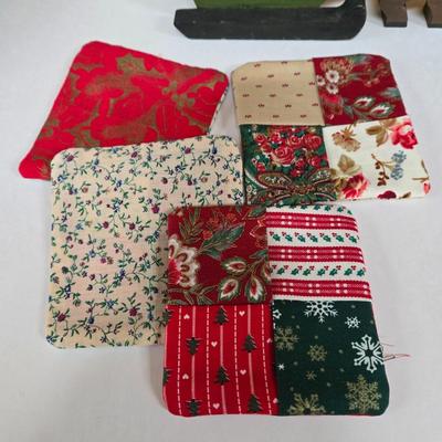 LOT 68P: Hand-Made Christmas Decor Including Two Stockings, Table Runners, Coasters, and More