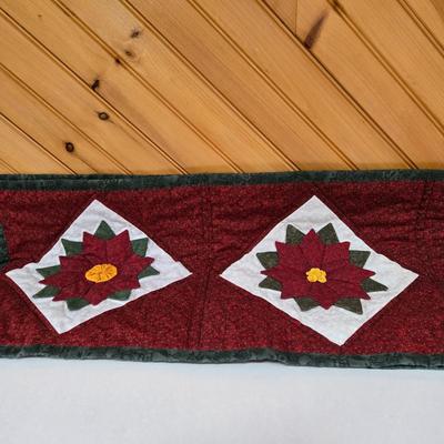 LOT 69P: Beautiful Hand-Made Christmas Decor Including Table Runners, Coasters, Two Stockings, and More