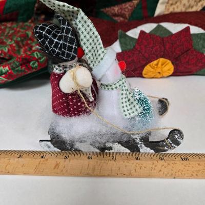 LOT 69P: Beautiful Hand-Made Christmas Decor Including Table Runners, Coasters, Two Stockings, and More