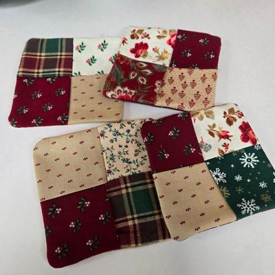 LOT 69P: Beautiful Hand-Made Christmas Decor Including Table Runners, Coasters, Two Stockings, and More