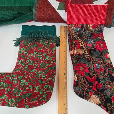 LOT 69P: Beautiful Hand-Made Christmas Decor Including Table Runners, Coasters, Two Stockings, and More