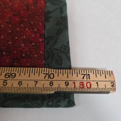 LOT 69P: Beautiful Hand-Made Christmas Decor Including Table Runners, Coasters, Two Stockings, and More
