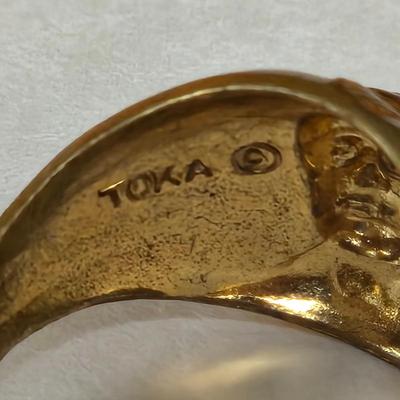 LOT 73P: Vintage Robbins Co. Saddle Ring, Toka Straight Arrow Ring, Straight Arrow Golden Nugget Cave Ring, and Straight Arrow Ring