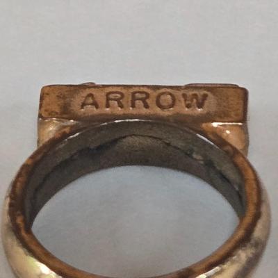 LOT 73P: Vintage Robbins Co. Saddle Ring, Toka Straight Arrow Ring, Straight Arrow Golden Nugget Cave Ring, and Straight Arrow Ring