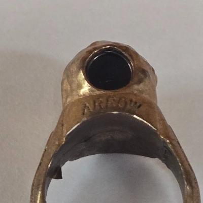 LOT 73P: Vintage Robbins Co. Saddle Ring, Toka Straight Arrow Ring, Straight Arrow Golden Nugget Cave Ring, and Straight Arrow Ring