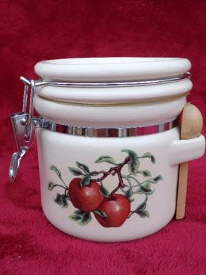 Beautiful ceramic 3 piece canister set. Locking lids,. Look like new/unused.