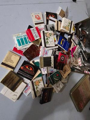 Sale Photo Thumbnail #277: Collector's matchbook and tin lot