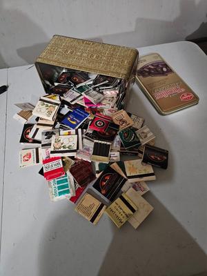 Sale Photo Thumbnail #276: Collector's matchbook and tin lot