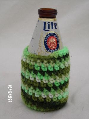 Crocheted beer cozy for can or bottle, nicely hand crafted.