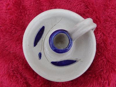 Ceramic candle stick (holder) from Williamsburg (VA) Pottery.