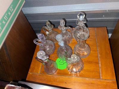 Sale Photo Thumbnail #509: Various Glass Decanters (Lot of 8). 7/8 have lids, 6/7 lids fit well. Great condition.