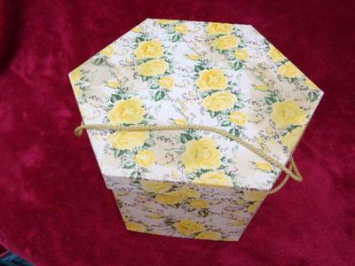 Seven VERY OLD ladies hats in a nice clean hex shaped hat box.