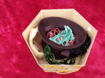 Seven VERY OLD ladies hats in a nice clean hex shaped hat box.