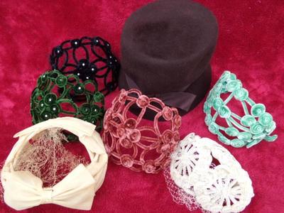 Seven VERY OLD ladies hats in a nice clean hex shaped hat box.