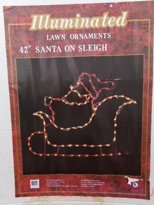 Christmas comes around every year. Lighted lawn ornament Santa