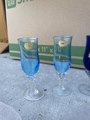 Sale Photo Thumbnail #602: Depression Glass Plates and Stemmed Shot Glasses/Candleholders (Lot of 9). 3 gorgeous pink hued glass plates, floral texture on the bottom of each. 6 small, stemmed glass cups; could be used as shot glasses, candleholders, etc.
