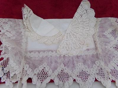 All hand crafted with care, 2 doilies and 1 small table cover/cloth.