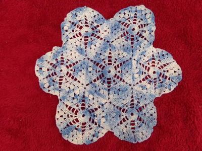 Pretty blue & white hand crafted crocheted doily. About 11".