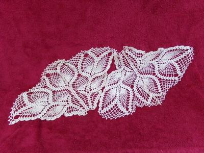 A pair of triangular crocheted doilies. Maybe for a round table.