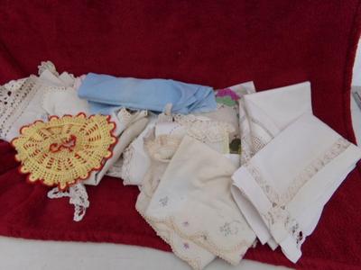 Box full of craft work, some unfinished, some not started, some soiled, some need repair. Crocheted, embroidered, etc.