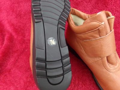 Pair of low cut womens’ boots, look new/unused in box 7M