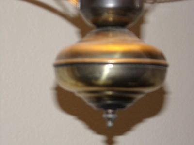 Swag lamp flash back to the 70s. Made to resemble 1800s oil lamp.