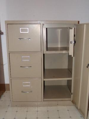 Combo file cabinet w/ small safe & 3 file drawers.