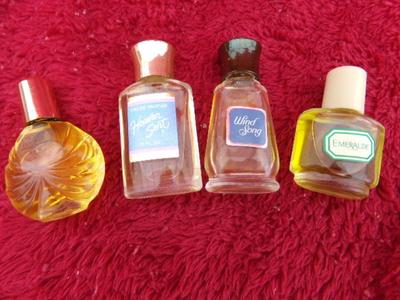 FOUR little bottles of cologne. All appear like new/unused.