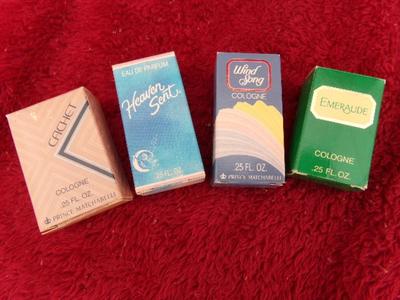 FOUR little bottles of cologne. All appear like new/unused.