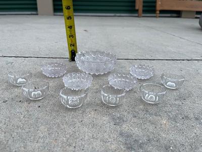 Sale Photo Thumbnail #757: Set of Antique Glass Salt Cellars (Set of 11). Believed to be Westmoreland Glass, but unsure.