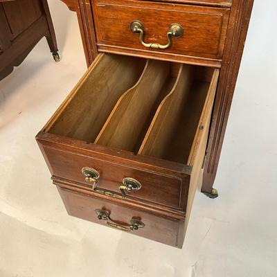 Sale Photo Thumbnail #206: Beautiful Angus of London Roll Top Tambour Desk with 8 drawers, eagle lock co brass hardware, brass pulls & know, missing one castor wheel, leather top has some wear 43" high x 48" wide x 27" deep desk height is 30.5"