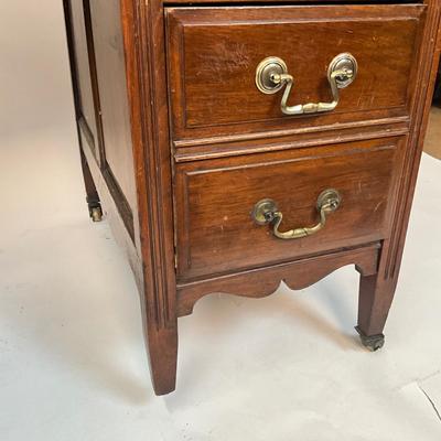 Sale Photo Thumbnail #207: Beautiful Angus of London Roll Top Tambour Desk with 8 drawers, eagle lock co brass hardware, brass pulls & know, missing one castor wheel, leather top has some wear 43" high x 48" wide x 27" deep desk height is 30.5"