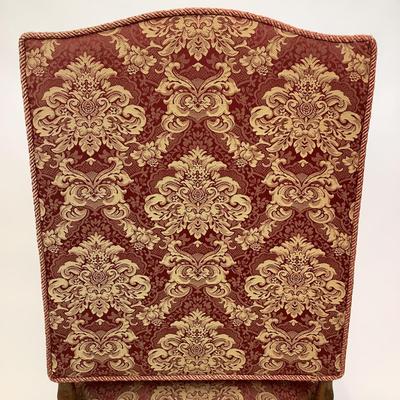 Sale Photo Thumbnail #229: Red & Gold Damask Upholstered seat (with damage) Chair itself is in good structural condition. carved walnut arms and claw feet with stretcher. measuring 46" high x 25" wide x 31" deep 18" seat height x 19" seat depth.