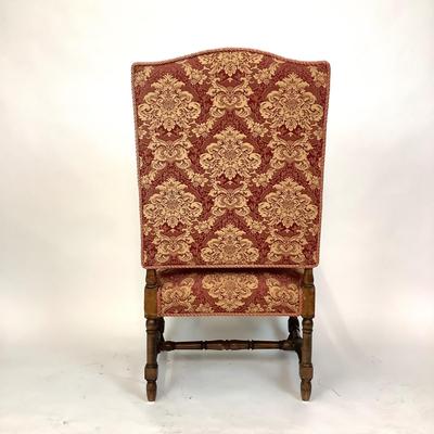 Sale Photo Thumbnail #228: Red & Gold Damask Upholstered seat (with damage) Chair itself is in good structural condition. carved walnut arms and claw feet with stretcher. measuring 46" high x 25" wide x 31" deep 18" seat height x 19" seat depth.