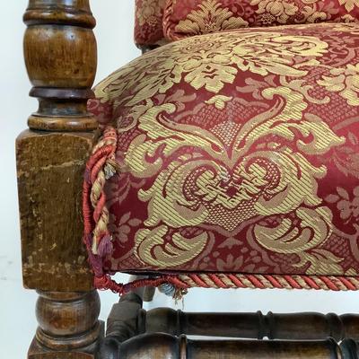 Sale Photo Thumbnail #230: Red & Gold Damask Upholstered seat (with damage) Chair itself is in good structural condition. carved walnut arms and claw feet with stretcher. measuring 46" high x 25" wide x 31" deep 18" seat height x 19" seat depth.