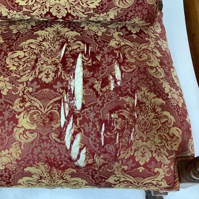 Sale Photo Thumbnail #231: Red & Gold Damask Upholstered seat (with damage) Chair itself is in good structural condition. carved walnut arms and claw feet with stretcher. measuring 46" high x 25" wide x 31" deep 18" seat height x 19" seat depth.
