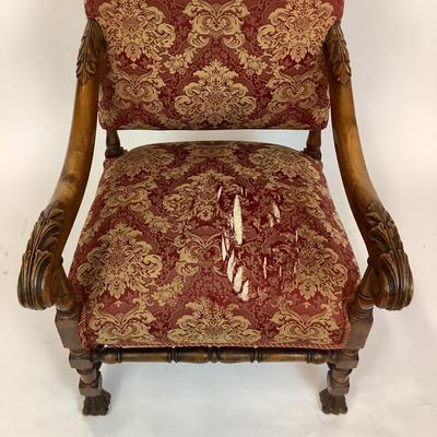 Sale Photo Thumbnail #232: Red & Gold Damask Upholstered seat (with damage) Chair itself is in good structural condition. carved walnut arms and claw feet with stretcher. measuring 46" high x 25" wide x 31" deep 18" seat height x 19" seat depth.