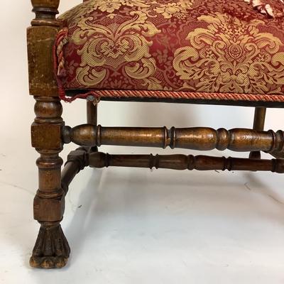Sale Photo Thumbnail #225: Red & Gold Damask Upholstered seat (with damage) Chair itself is in good structural condition. carved walnut arms and claw feet with stretcher. measuring 46" high x 25" wide x 31" deep 18" seat height x 19" seat depth.